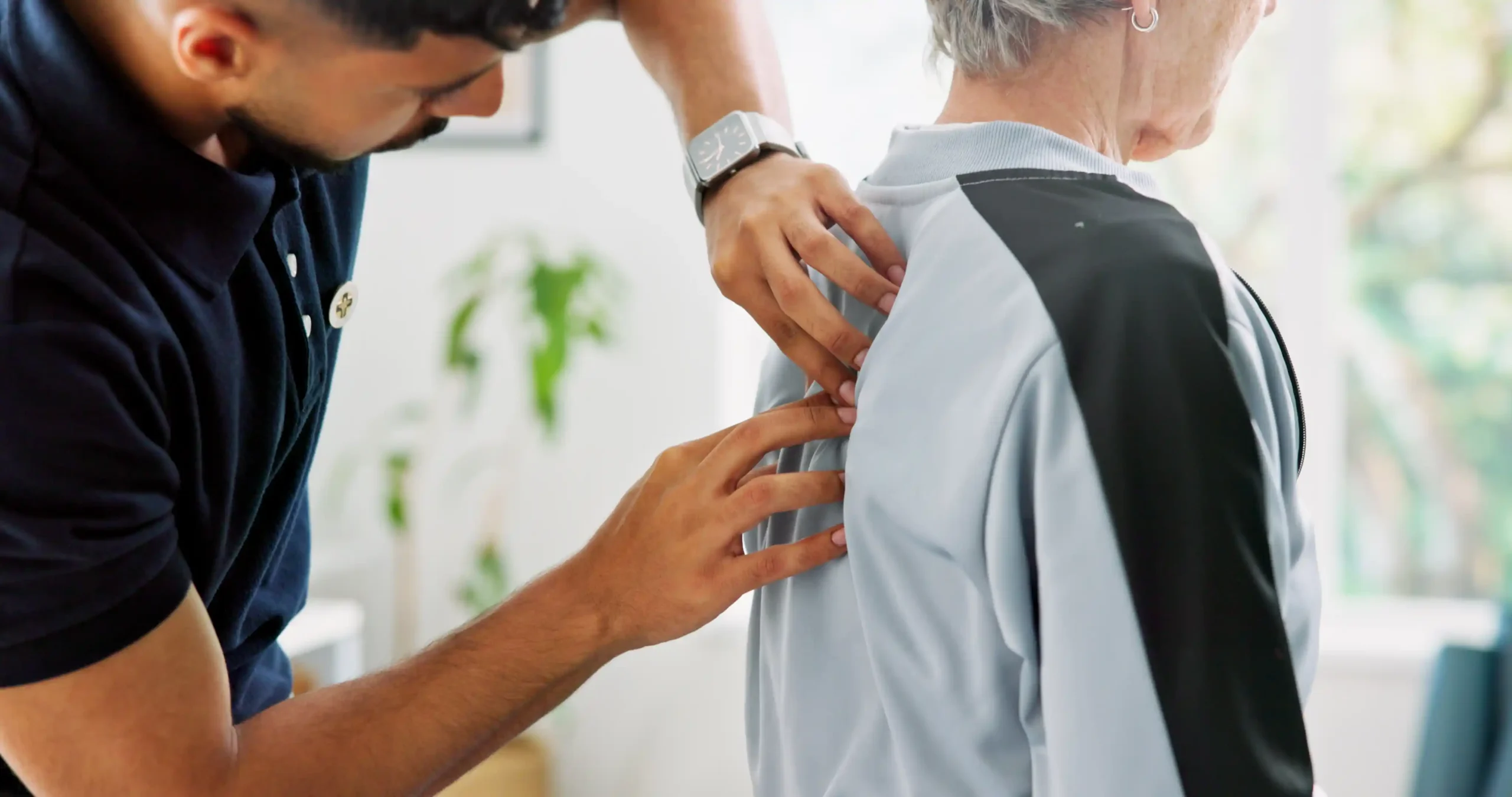 What Is Back Manipulation? Benefits, Safety, and Spinal Manipulation 2 chiropractor hands old woman clinic with back exam physiotherapy massage rehabilitation elderly person physiotherapist spine evaluation acupressure medical help wellness scaled