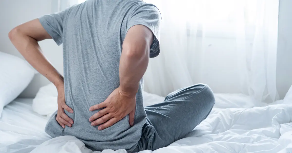 lower back pain after sleeping